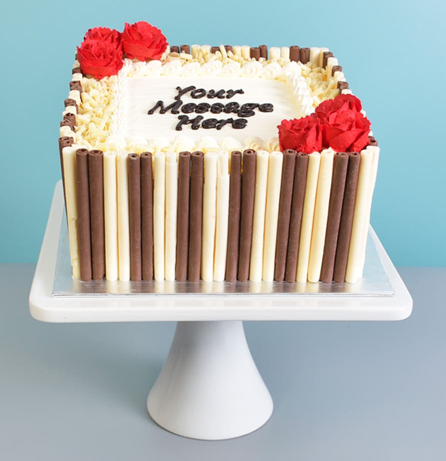 Cigare au chocolat et fleurs rouges